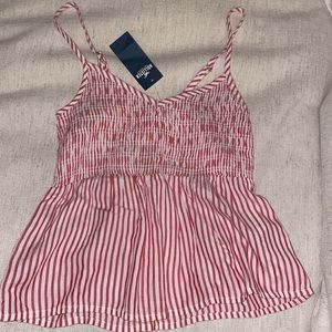 Cropped fitted red and white striped tank top
